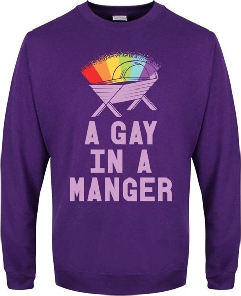 a gay in a manger christmas jumper
